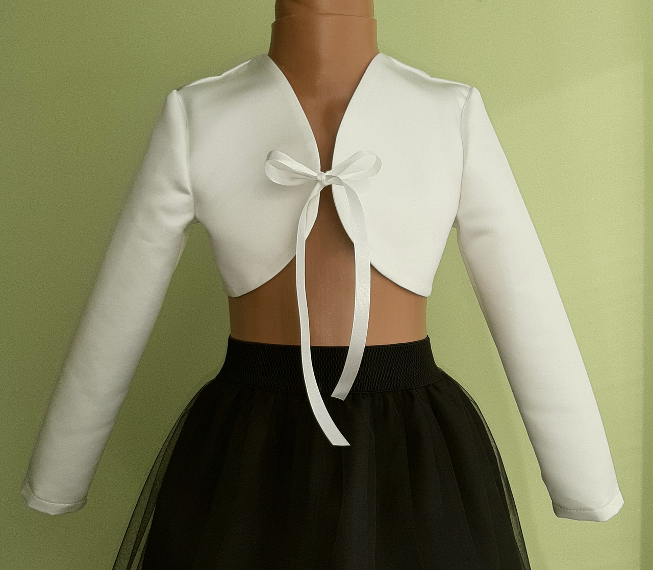 Дитяче атласне болеро кольору айворі, зі стрічкою, розмір 104