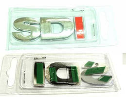 Емблема - напис "SDI" на багажник_ (I червона) 73х26мм (блістер)