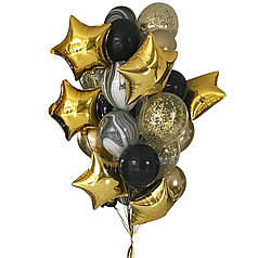 Оформлення кульками для чоловіка в чорно-золотому кольорі з зірками