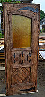 Двері дерев'яні під старовину з вітражами та кованними деталями