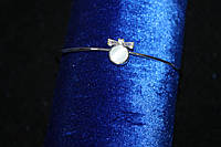 Изящный серебристый браслет на руку с кулоном бантик