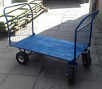 Двухсторонняя платформенная грузовая тележка 4-х колесная , пневматическое колесо.