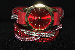 Привабливий жіночий годинник довгий червоний ремінець намотування