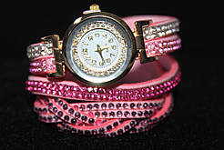 Розкішний жіночий годинник на довгому ремінці рожевий
