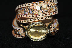Ніжний жіночий годинник — намотка довгий ремінець золотистий корпус