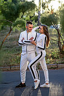 Парные спортивные костюмы для парня и девушки в белом цвете