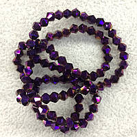 Намистини на нитці Скло биконус 4мм колір фіолетовий металік (~100 намистин на нитці)