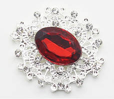 Камінь в сріблястій ажурній оправі 24*26 мм бордо