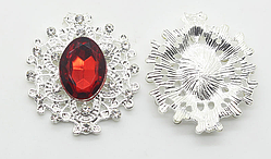 Камінь в сріблястій ажурній оправі 24*26 мм червоний