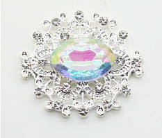 Камінь в сріблястій ажурній оправі 24*26 мм хамелеон срібло