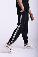 Чорні штани з білими лампасами Kappa