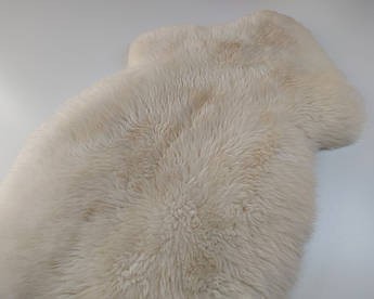 Натуральна овеча шкура біла | хутряна накидка | коврик | накидка на крісло 120×60 см (+/- 5 см)