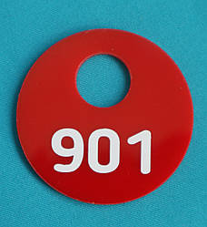 Жетон для одягу в гардеробі червоний