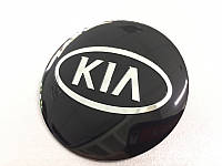 Наклейки Kia D56 мм алюминий (Серебристый логотип на черном фоне)