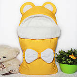 Зимовий конверт на виписку на хутрі під овчину з бантом, фото 4