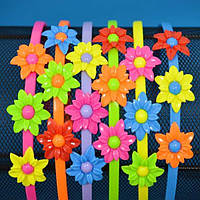 Обруч для волосся кольоровий пластик із квітами