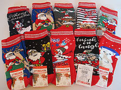 Дитячі махрові шкарпетки з новорічним малюнком.