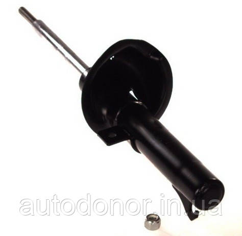 Амортизатор передній газомасляний KYB Ford Fiesta, Mazda 121 c ГУР (95-02) 333704