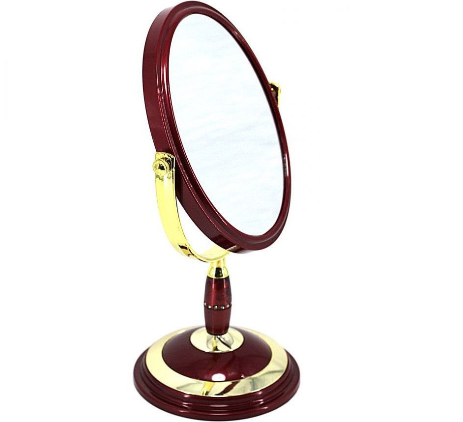 Дзеркало настільне на ніжці.