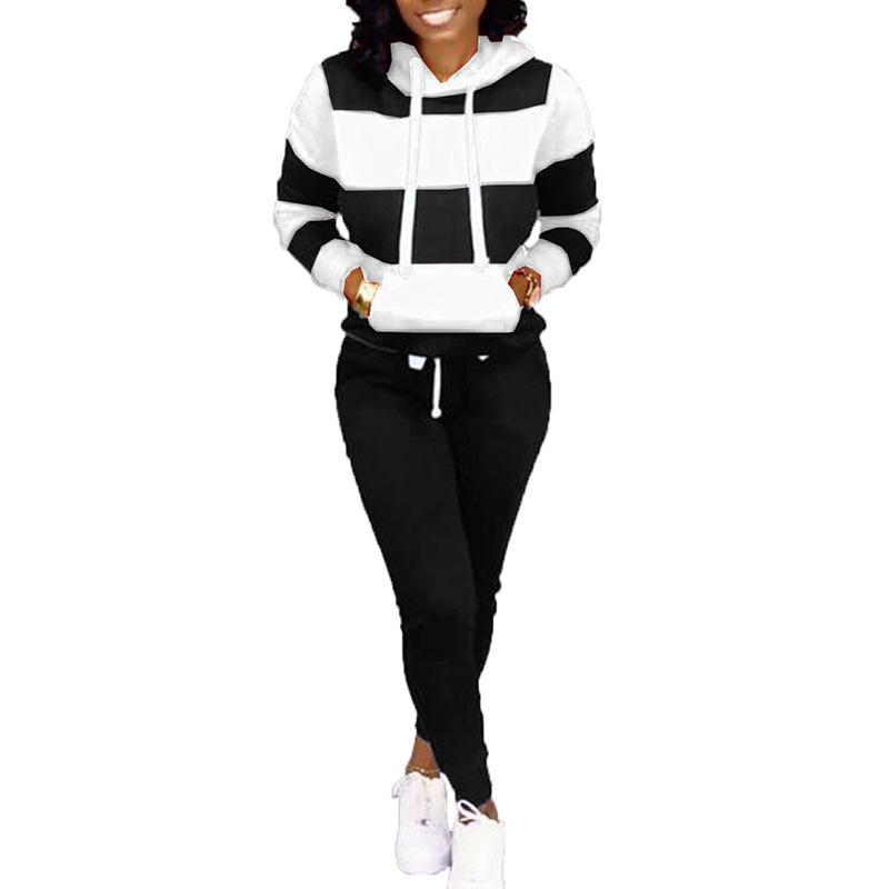 Костюм женский спортивный чёрного цвета с белыми вставками и с капюшоном One-Point