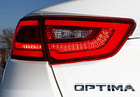 Эмблема надпись багажника Kia Optima оригинал