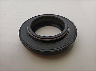 Сальник 28х48х5/12 штока амортизатора з пружиною в зборі