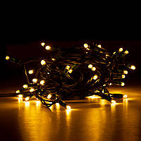Электрогирлянда LED уличная Yes Fun 65 ламп IP 65 тепло-белая зеленый провод 12.25м код: 801164