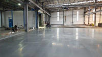 Влаштування промислової бетонної підлоги зі зміцненим верхнім шаром