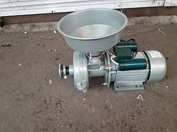 Жорнова зернодробілка з регулюванням ступеня помелу