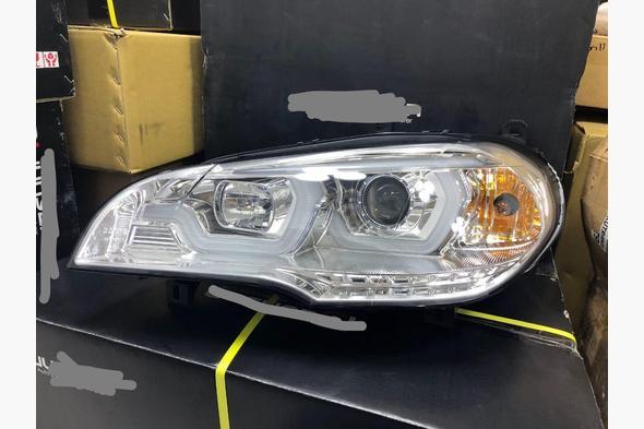 Передні фари (2 шт., світлі) BMW X5 E-70 2007-2013 рр.