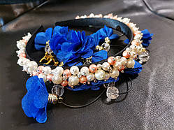 Обшитий перловими намистинами