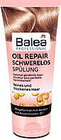 Бальзам ополаскиватель для сухих и поврежденных волос Balea Professional Oil Repair Schwerelos