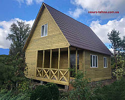 Каркасний будинок 6,0 м х 8,0 м із фальшбруса з мансардою.