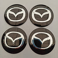 Наклейка опукла на ковпачок диска Mazda 56 мм чорна