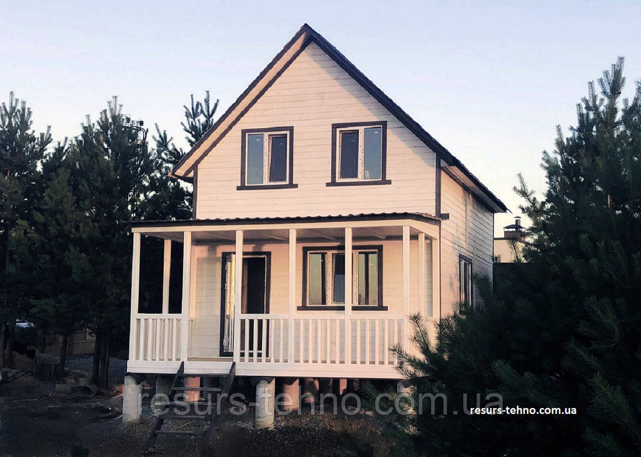 Каркасний будинок 5,0 м х 7,0 м із фальшбруса з мансардою та терасою