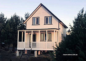 Каркасний будинок 5,0 м х 7,0 м із фальшбруса з мансардою та терасою