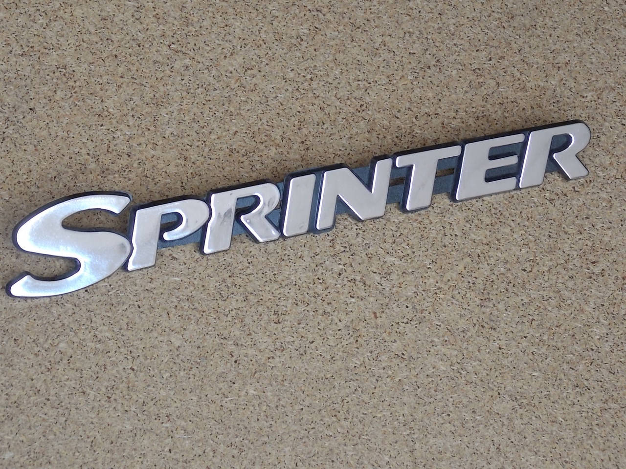 

Надпись "Sprinter" задней двери
