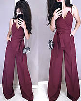 Стильний комбінезон зі штанами кльош верх на бретельці з декольте, фото 4