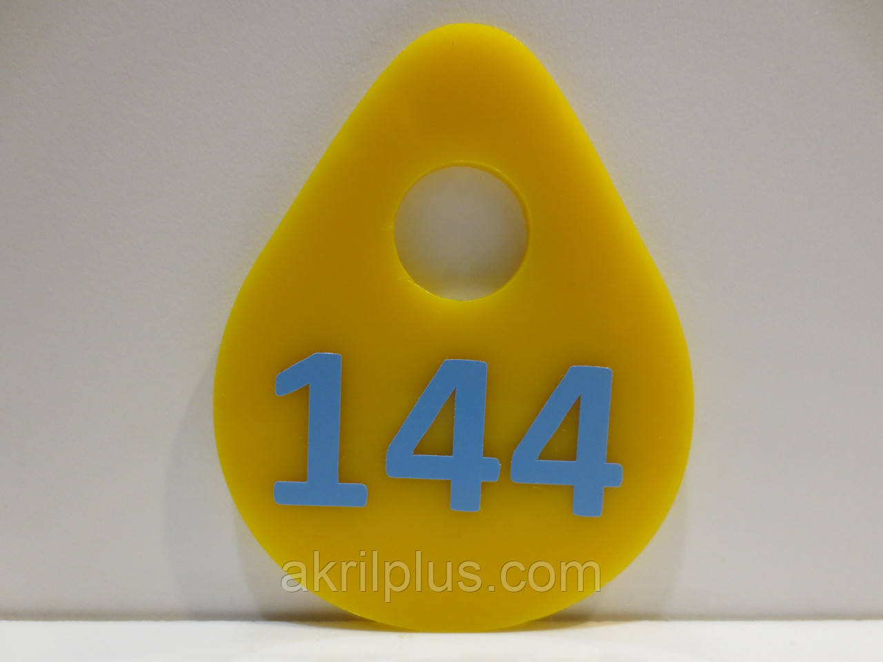 Брелки для ключів 60*45 мм жовті