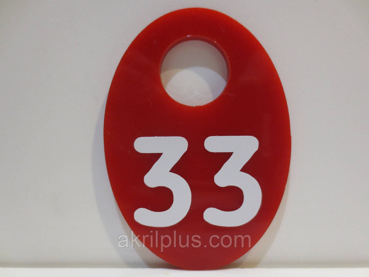 Номерок червоний у гардероб 50*70 мм овальний