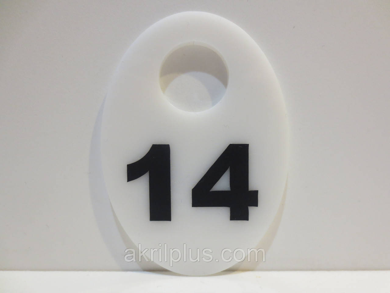 Номерок білий у гардероб 50*70 мм овальний