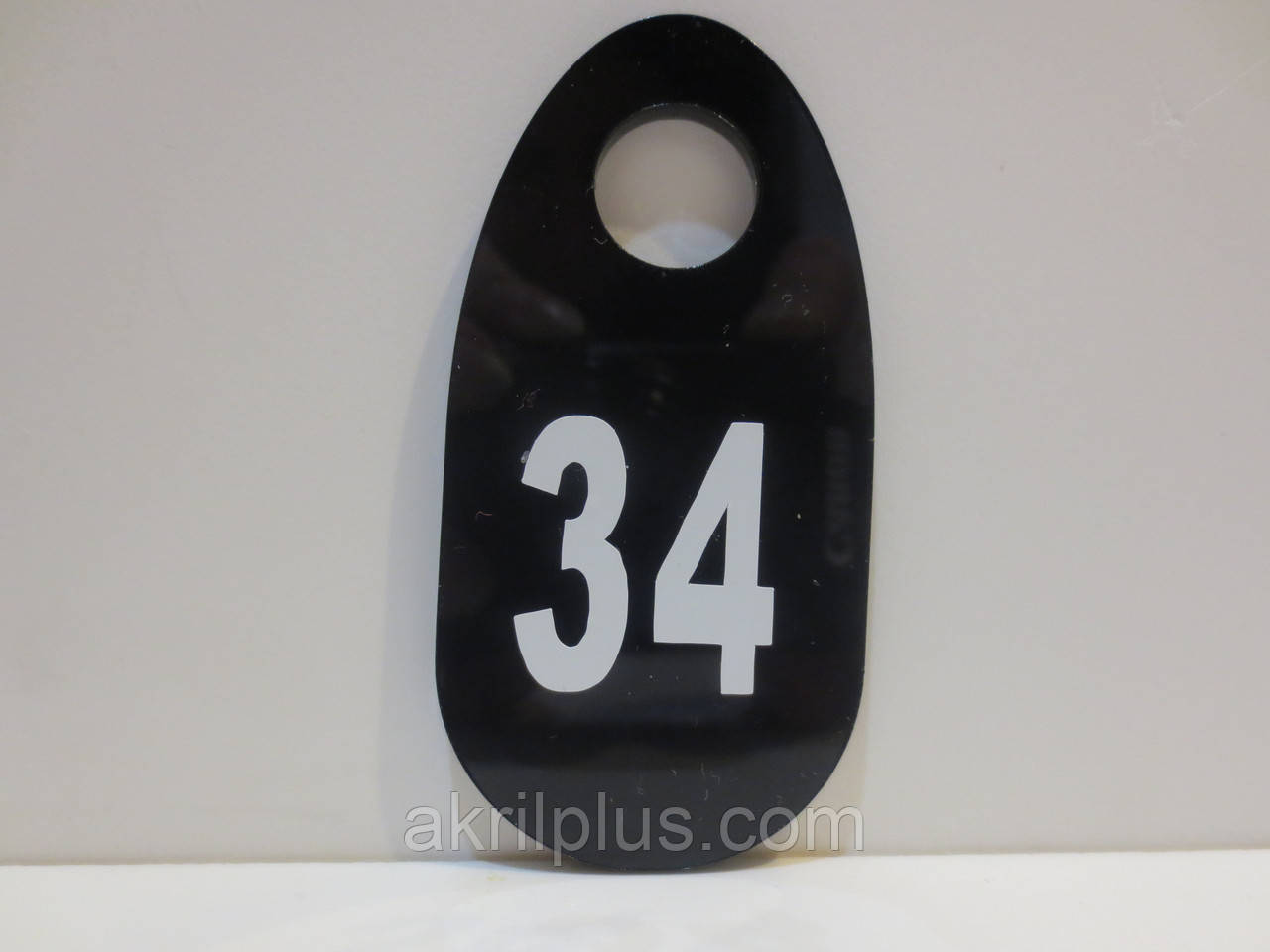 Номерки універсальні для роздягальні, на ключі 70*35 мм чорні