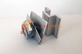 Притиск центральний, міжпанельний "U - подібний" у зборі під оцинкований профіль