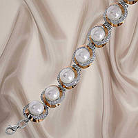 Жіночий срібний браслет із золотими вставками і перлами
