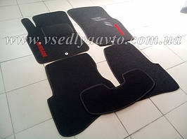 Килимки на Nissan Almera