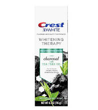 Вибілювальна вугільна зубна паста Crest 3D white Whitening Toothpaste charcoal Tea tree oil 116г