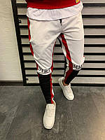 Молодёжные бело-красно-чёрные спортивные штаны мужские зауженные с надписью на коленях L, XL размер