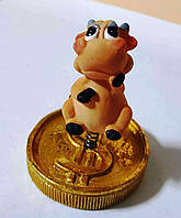 Статуека з биком, телец — грошовий символ