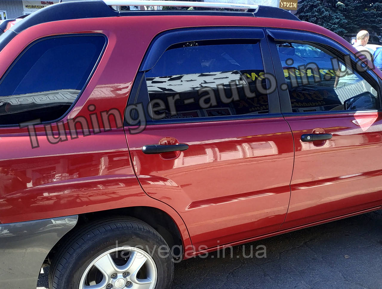 Вітровики, дефлектори вікон Kia Sportage 2004-2010 (Autoclover)