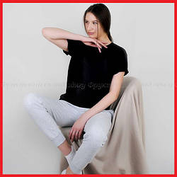 ЖІНОЧІ СПОРТИВНІ КОСТЮМИ